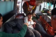 Pakistani Rescue Workers take out Students from An Ambulance