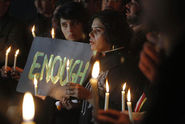 Pakistani Civil Society Members take part in a Candle Light Vigil for the Victims