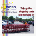 Help gather shopping carts in a parking lot