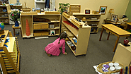 A four year old mopping the classroom! Is it a Montessori classroom?