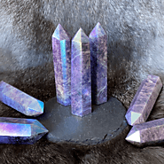 Lepidolite point with aura, dark purple