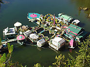 Couple Lives Off The Grid After Spending 20-Years Building Self-Sustaining Floating Island