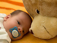 When can my baby sleep with a stuffed animal or doll? | BabyCenter