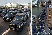 More than 200 black cabs bring London Bridge to a standstill in protest against Uber