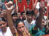 Hundreds of Bangladesh Garment Factories Shut Down as Women Take to Streets in Dhaka