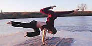 This couple used a floating iceberg on a Russian lake to perform their yoga routine