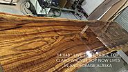 14' claro walnut custom top with live edges. Recycled wood top built with solar power.