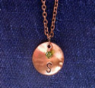 http://www.suzannamcmahan.com/#!product/prd1/3338948051/initial-charm-necklace-in-copper