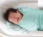 Baby laughing while sleeping