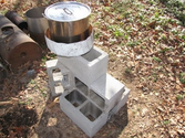 Simple pot skirt on Rocket stove for higher efficiency