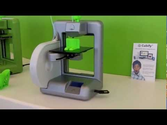 3D printer in action making real 3D models - can make shoes, guns - anything!