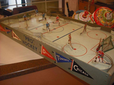 Play table hockey