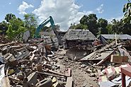 Quake cuts power topples buildings on the Indonesian island