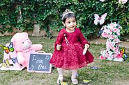 First birthday party of 'lil M, an outdoor party with a butterfly decor