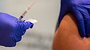 Federal Agency Says Employers Can Require Workers to Get COVID-19 Vaccine