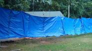 NC man puts up massive tarp to block neighbor's surveillance camera