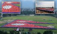 Thirty-five thousand Nepalese gather in a field outside Kathmandu