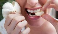 Chew on some garlic to relieve gastric problems