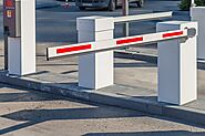 How does a Boom Parking Barrier Help in the Parking Management System?