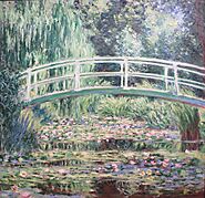 Japanese Bridge over a Pond of Water Lilies