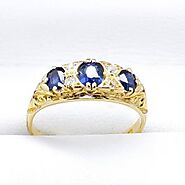 Antique Sapphire Trilogy Ring with three Stunning Natural Blue Sapphires with Four Pave set Old Cut Diamonds