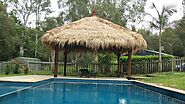 Complementing this Majestic Pool | East Coast Bali Huts and Gazebos