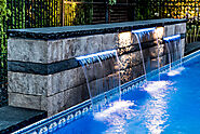 12 Unconventional Waterfall Designs to Elevate Your Backyard Swimming Pool