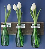 17 creativas ideas para reciclar botellas de vidrio que amarás tener en tu hogar | Florero con botellas, Artesanías c...