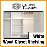 white wood closet shelving