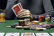 Start by playing with low-stakes poker