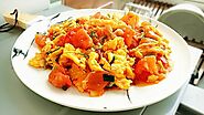 Website at https://chinesefoodfan.com/recipes/scrambled-eggs-with-tomatoes/