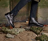 Black and brown leather boots.