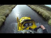 Snowmobile Down Rapids in Iceland - TRAVEL MEDIA HOTELS DISCOUNTS COMPARE HOTELS RATES