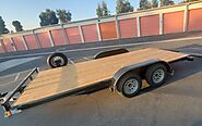 7x18 Flatbed Trailer - Tandem Axle & Wood Floor | Trailer Rental Services