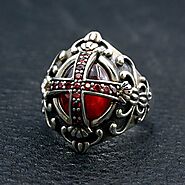 Website at https://www.vvvjewelry.com/shop/sterling-silver-gothic-ruby-vampire-cross-ring/