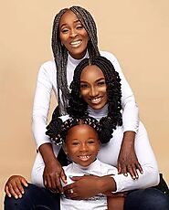 Braiding hair mother daughter duo