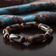 Tibetan Dzi Mala: Made with Seven Tiger Teeth Dzi Beads - Mantrapiece