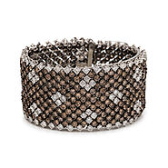 Website at https://auctiondaily.com/item/colored-diamond-and-diamond-bracelet/