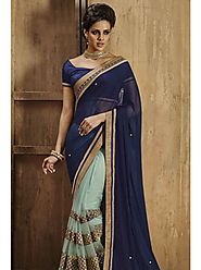 VINTAGE FLAVOUR 9022:- Net Skirt Saree With Mirror Work Running Borders.Pallu In Navy Chiffon And Blouse In Navy Dupion