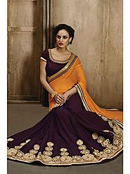VINTAGE FLAVOUR 9025:- Wing Georgette Saree With Pallu in Orange Chiffon.Blouse in Wine Dupion With Embroidered Neck.