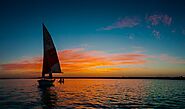 Go on a sail at sunset