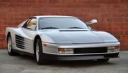 Ferrari Testarossa. Personally one of my favourites of all time. The edged side along with the 12 cylinder grunt is a...