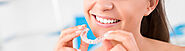 Dentist Answering FAQs About Invisalign Treatment