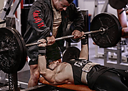 What is the Significance of Wearing a Weightlifting Belt for a Bench Press?