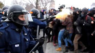 Canadian cops fire tear gas at student protesters' faces (VIDEO)