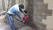 Cutting concrete block with diamond chainsaw