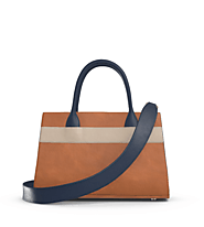 Website at https://laudividni.com/products/courante-leather-carryall-bag