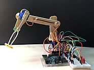5. Arduino with Servo motors to create a robotic arm