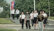 सायरन बजने पर उत्तर कोरिया के लोग हुए मौन, राष्ट्रीय ध्वज आधा झुका - north korea calls for solidarity on kim jong ils...
