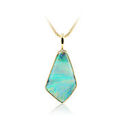 Boulder Opal Pendant set in 18k with Diamonds displaying Delicate Blue, Green and Pink